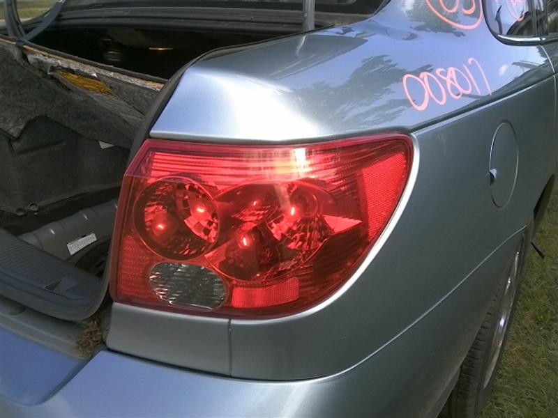 2003 SATURN SATURN L SERIES  05 (Sdn) Quarter Panel Mounted R. Taillight